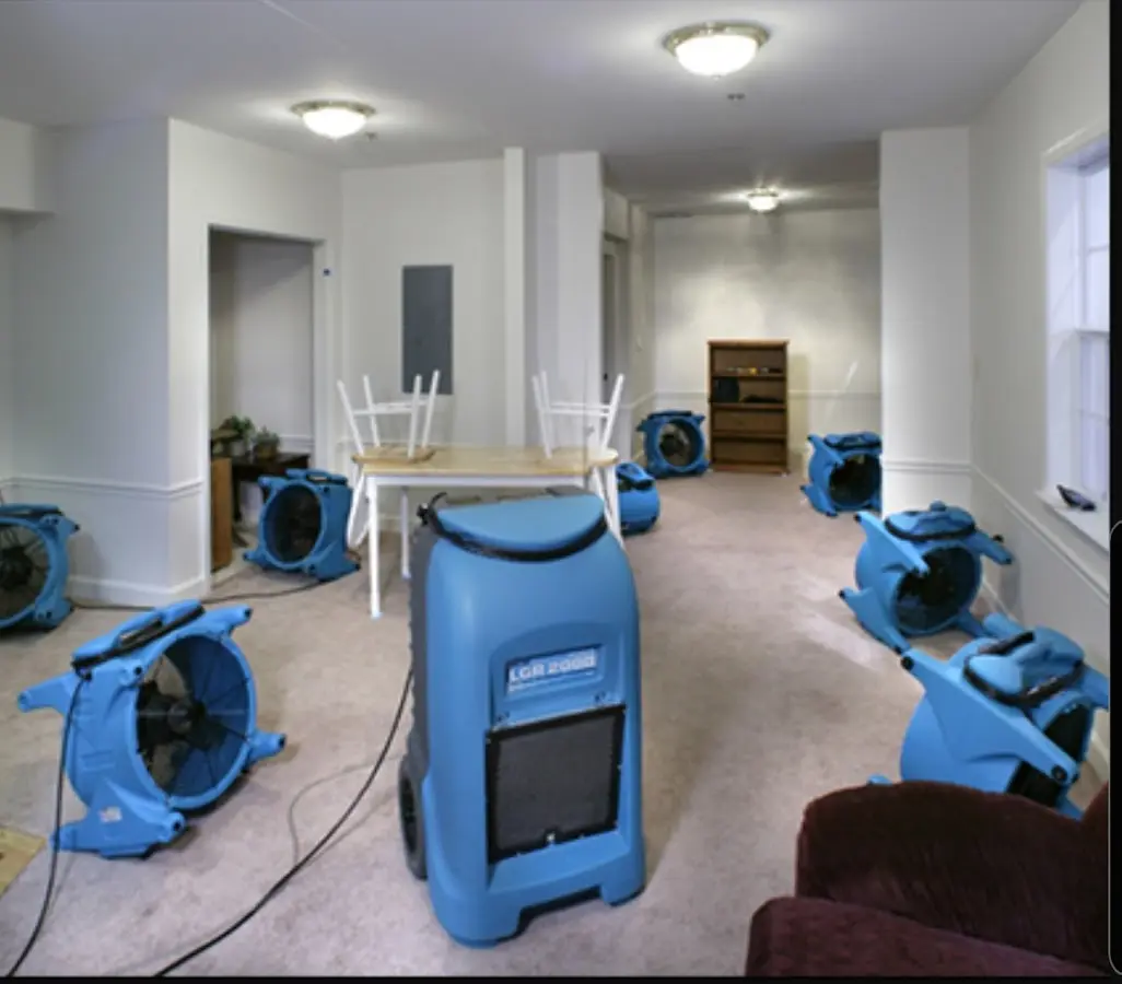 Air movers and dehumidifier setup for Water Damage Restoration in Niles